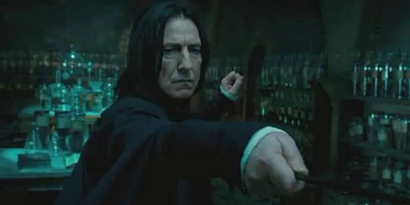 Snape (actor Alan Rickman) aims his wand in Harry Potter and the Order of the Phoenix