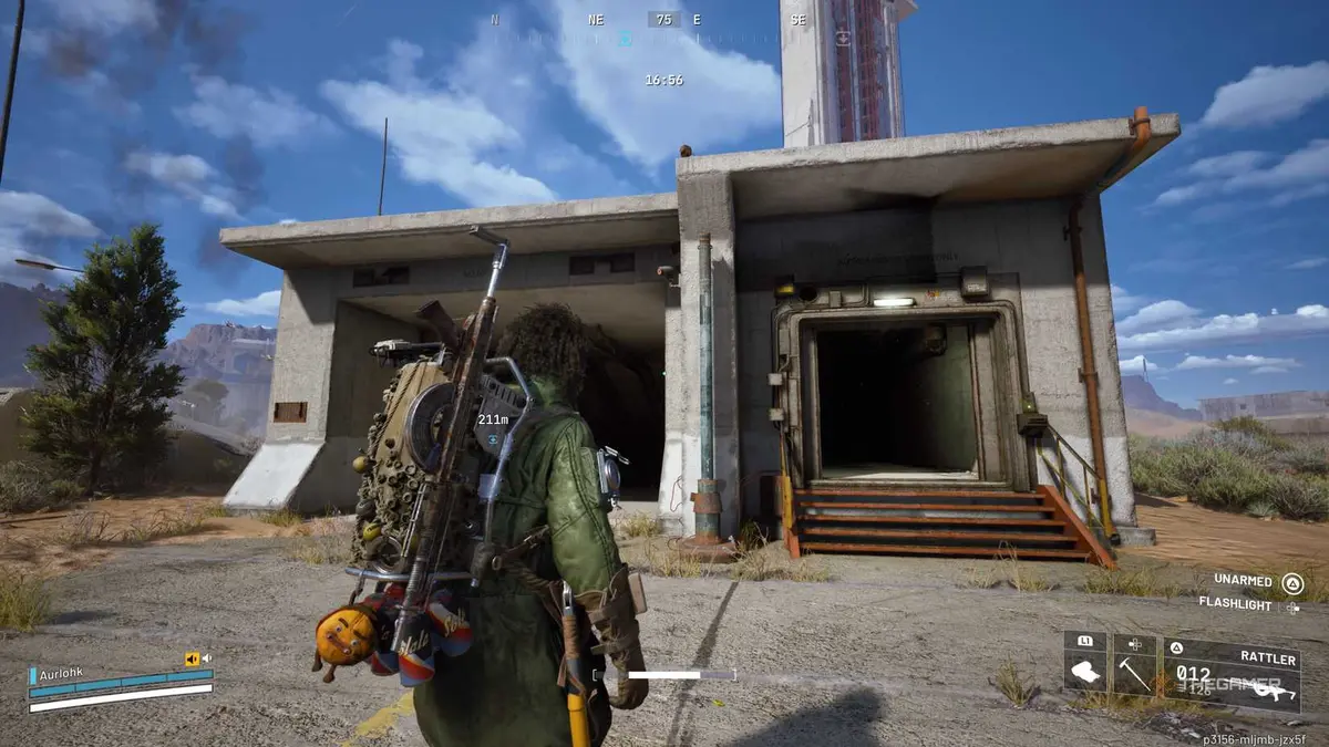 Player raider standing in front of a small building with two entrances to the Spaceport tunnels in Arc Raiders.