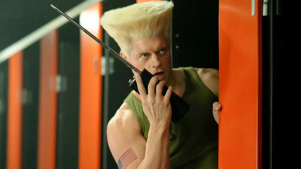 Cody Rhodes as Guile using a walkie talkie in Street Fighter 2026