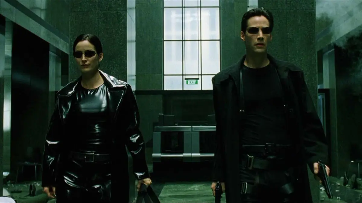 Keanu Reeves as Neo and Carrie Anne Moss as Trinity in The Matrix