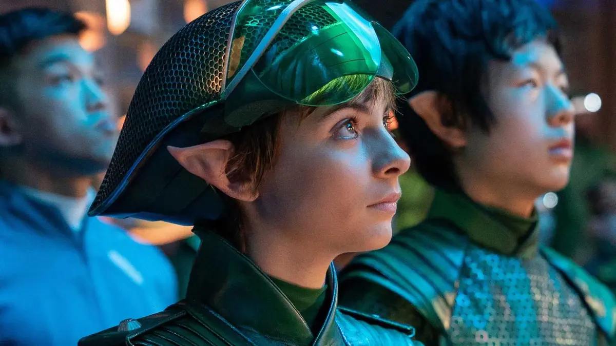 A young girl looking up at something in Artemis Fowl