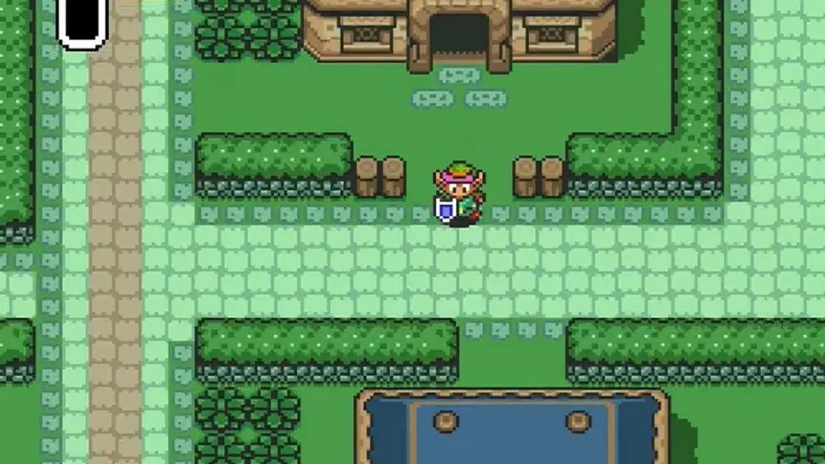 The Legend of Zelda A Link to the Past gameplay screenshot of link exiting a dungeon while holding a shield