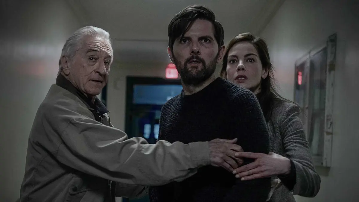 Robert de Niro and Michelle Monaghan hold back Adam Scott in The Whisper Man