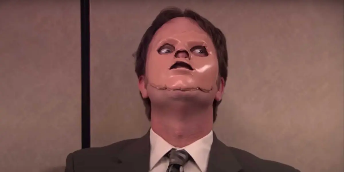Dwight wearing a CPR dummy's face in The Office Season 5