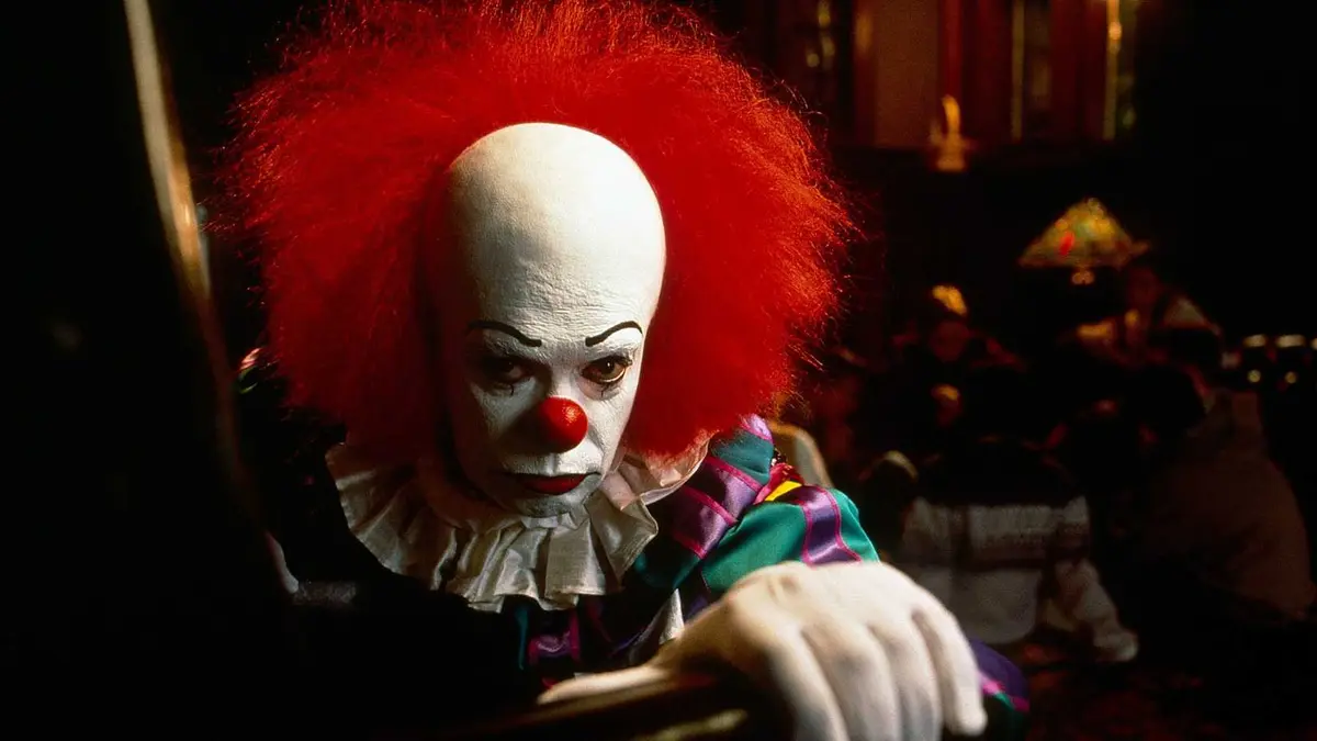 Tim Curry as clown Pennywise in 1990 miniseries It