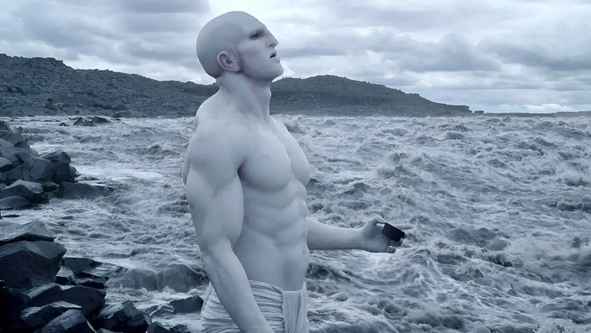 An engineer sips water at the outset of Ridley Scott’s Prometheus