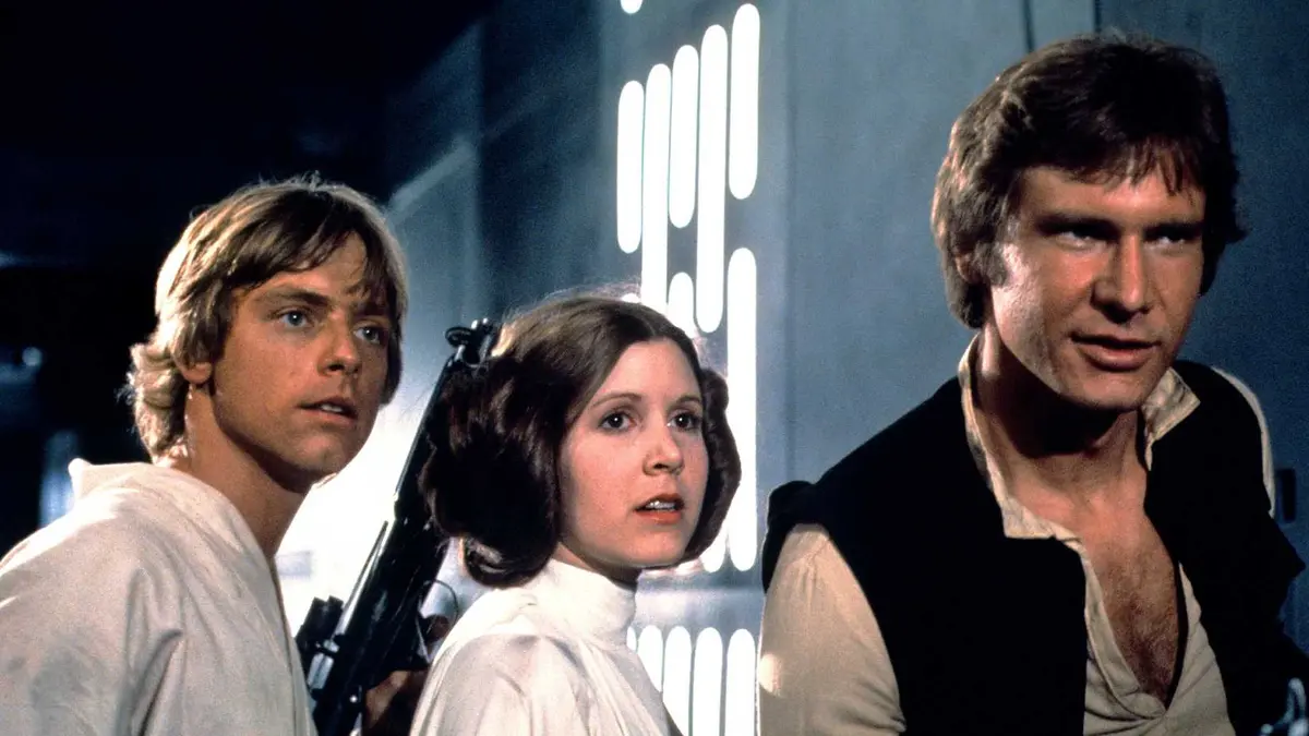Luke Skywalker (Mark Hamill), Leia Organa (Carrie Fisher), and Han Solo (Harrison Ford) aboard the Death Star in Star Wars: A New Hope