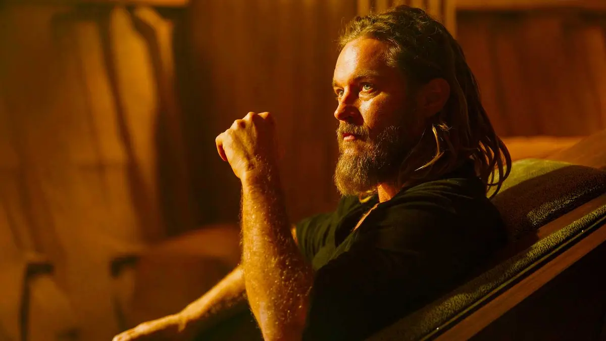 Desmond Hart sitting in a chair in Dune Prophecy