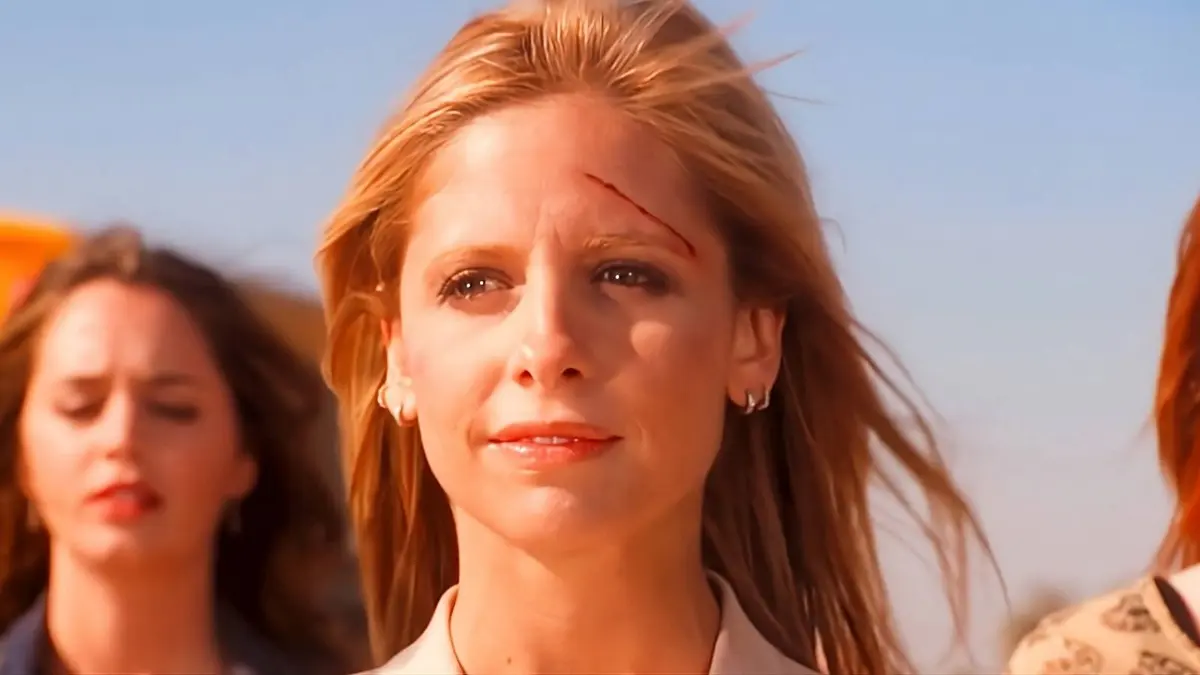 Buffy Summers slightly smiling while looking forward in the Buffy the Vampire Slayer series finale