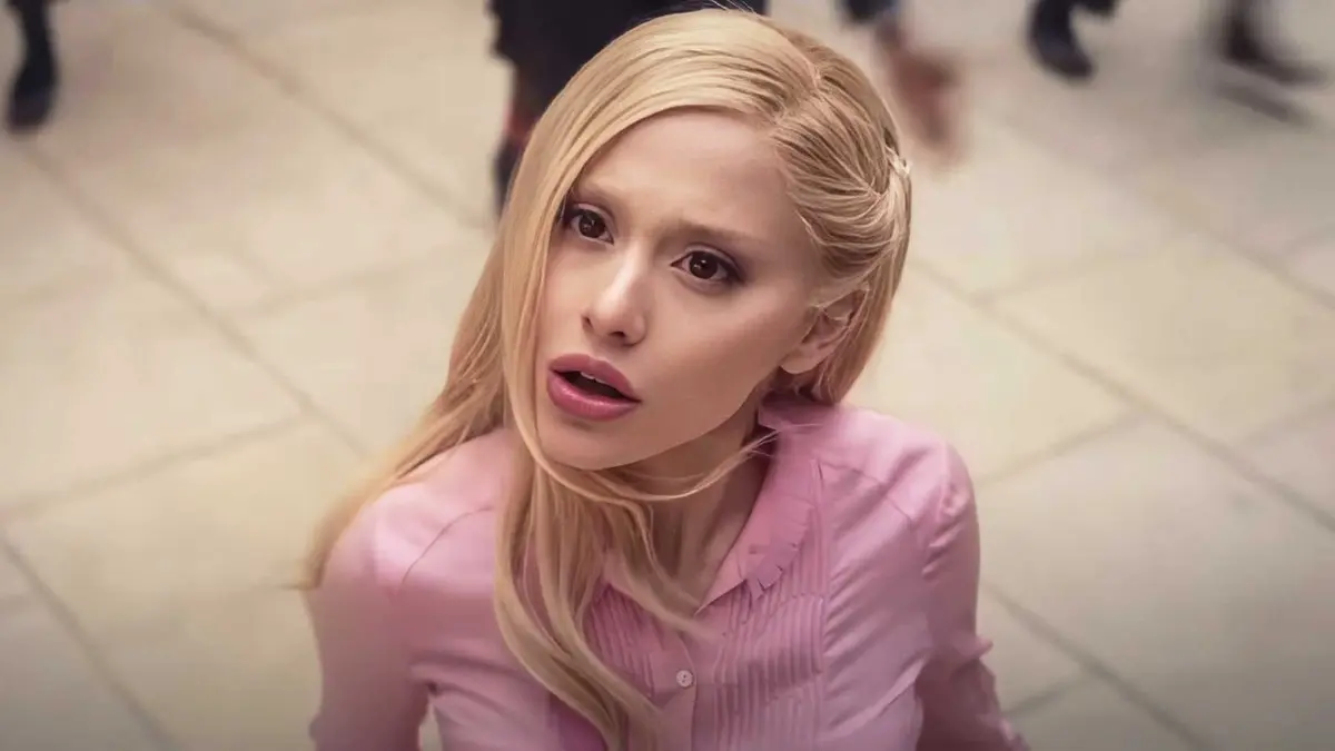 Ariana Grande as Glinda looking up in Wicked