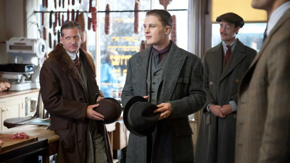 A group of men wearing prohibition era costumes in the crime drama Boardwalk Empire.