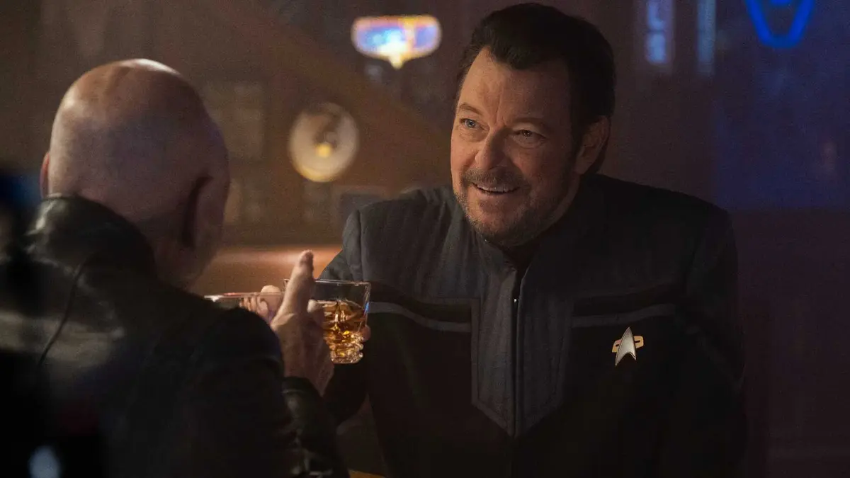 Jonathan Frakes as Riker toasts Picard