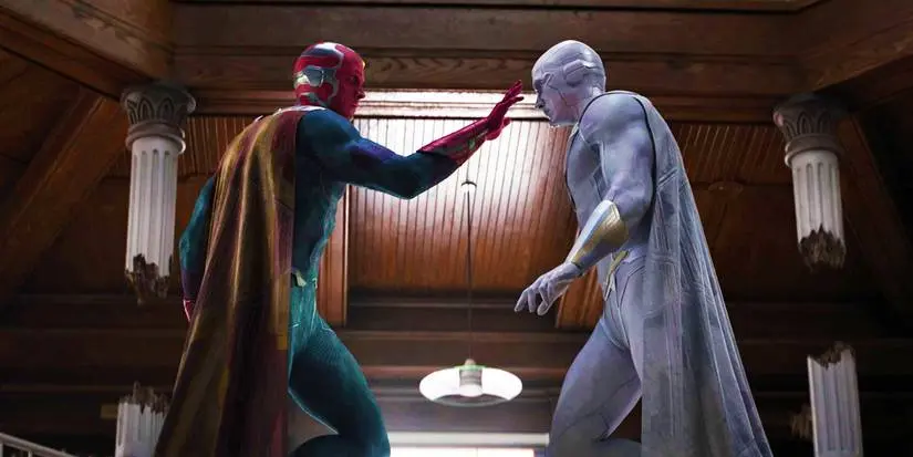 Vision and White Vision coming to an agreement, with Vision touching White Vision's forehead, in WandaVision