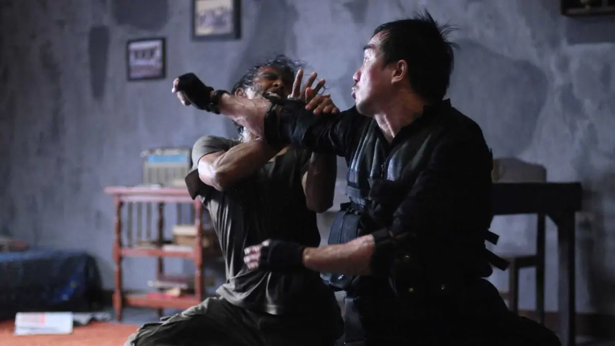 Two men fight in The Raid: Redemption
