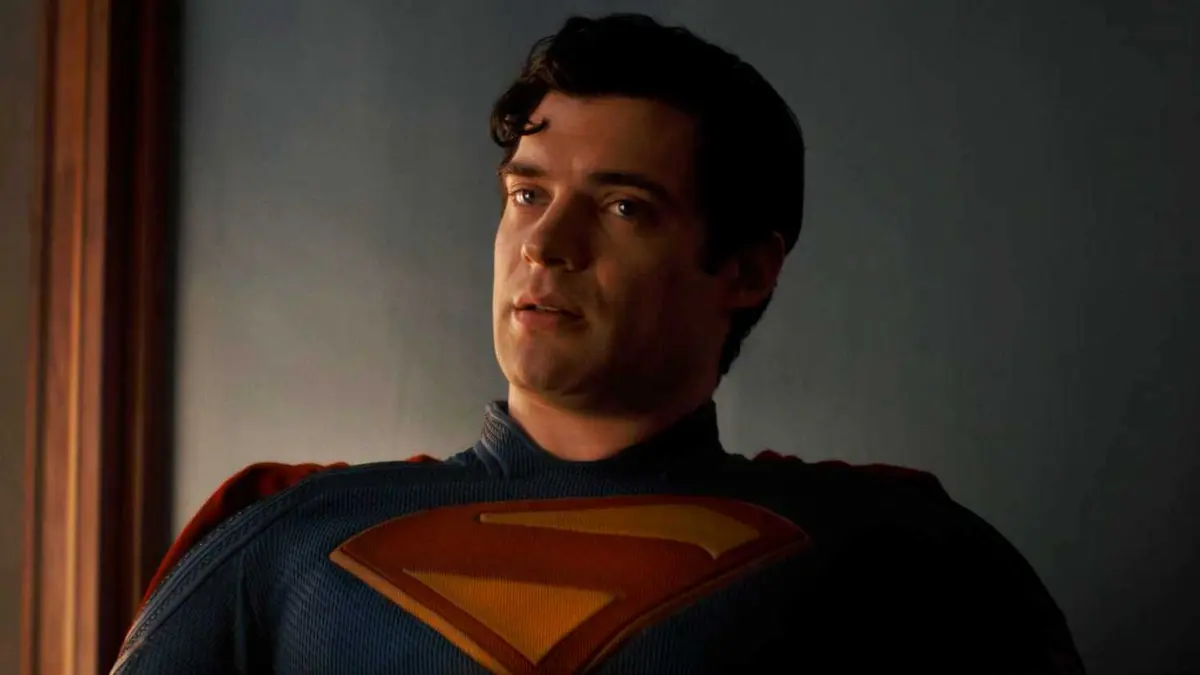 David Corenswet's Superman sitting in Supergirl