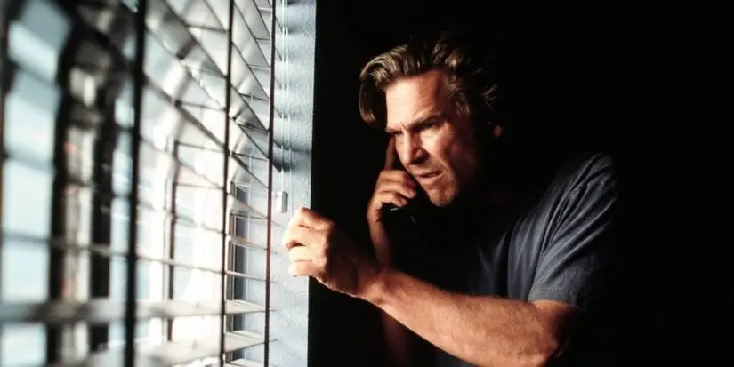 Michael Faraday (Jeff Bridges) looking out the window in Arlington Road
