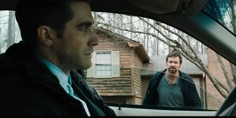 Keller approaching Loki's car window in Prisoners