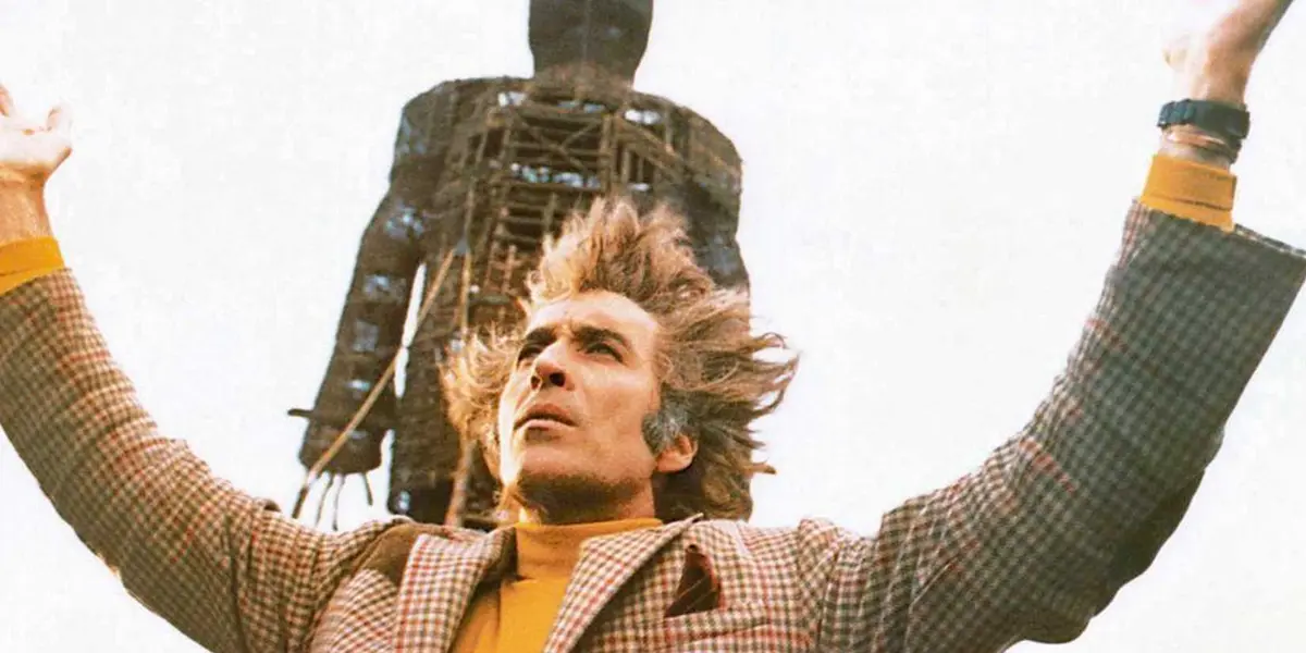 Christopher Lee with outstretched arms in The Wicker Man