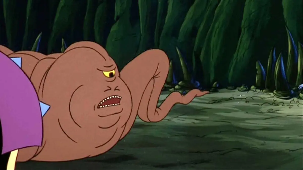 Sh'gora creeping on the ground in He-Man