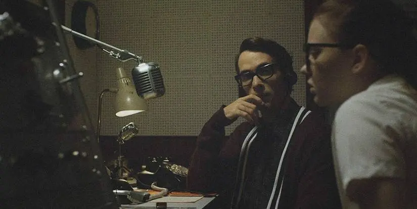 Fay and DJ Everett in a radio booth in The Vast Of Night