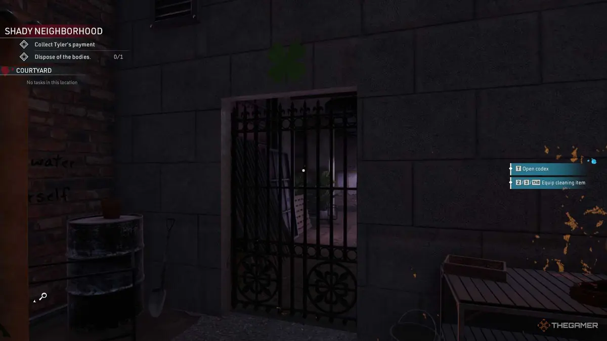 Kovalsky is standing in front of a iron barred door in Crime Scene Cleaner