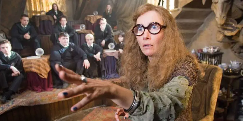 Emma Thompson as Sybill Trelawney in Harry Potter looking off-screen