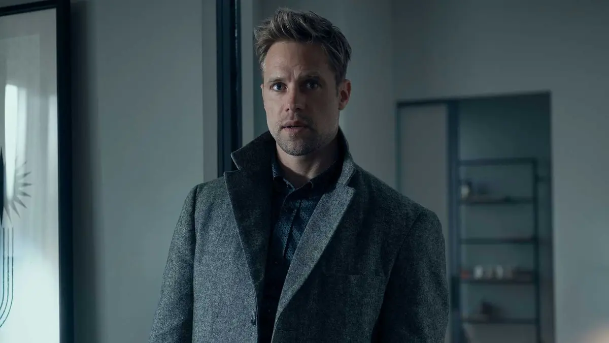 Shaun Sipos as David O'Donnell staring at someone in Reacher.