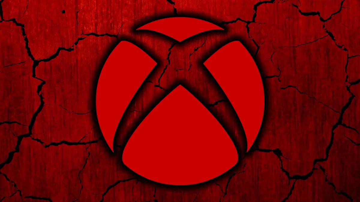 The red Xbox logo is superimposed over a red background with cracks.