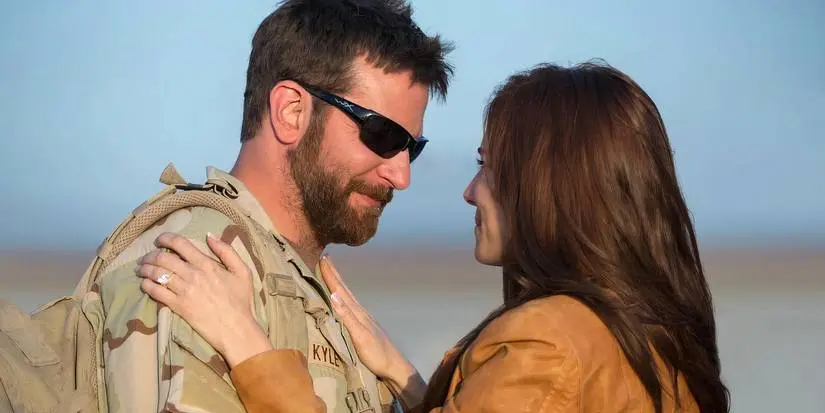 Bradley Cooper looks lovingly at Sienna Miller in American Sniper