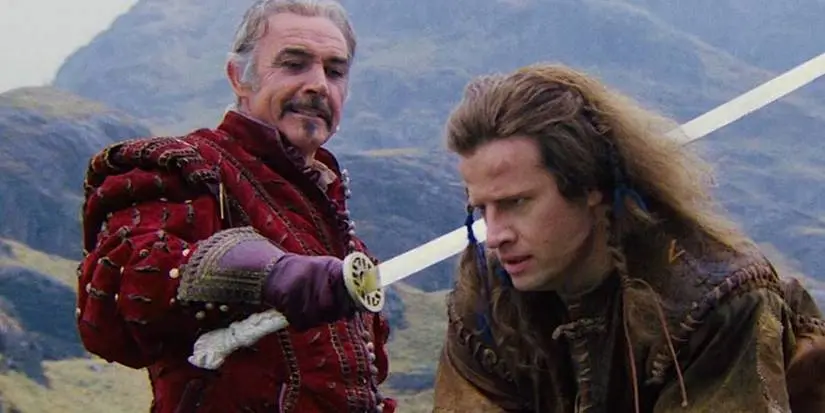 Highlander: Sean Connery's Ramirez holding a sword to the neck of Christopher Lambert's Connor MacLeod.