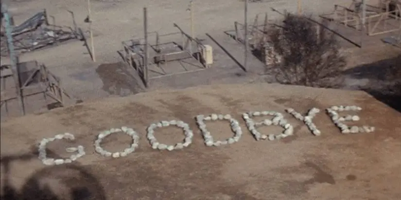 The goodbye message written with stones on the ground in the MASH finale, “Goodbye, Farewell and Amen.”