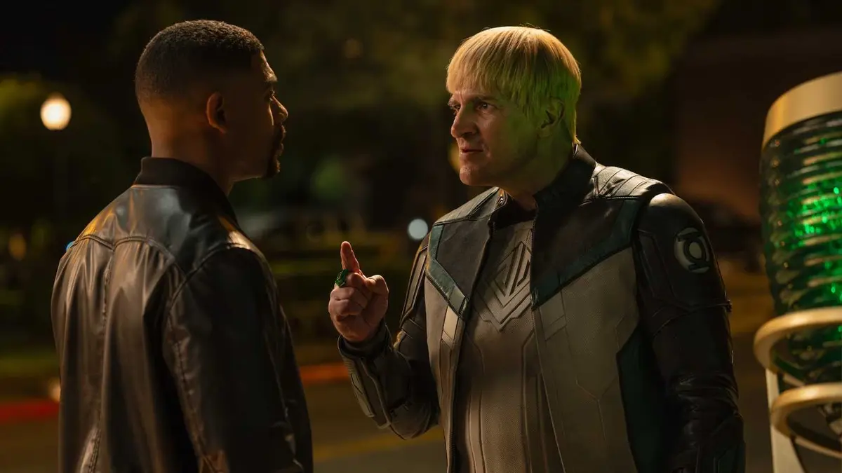 Guy Gardner arguing with John Stewart next to Green Lantern Signal