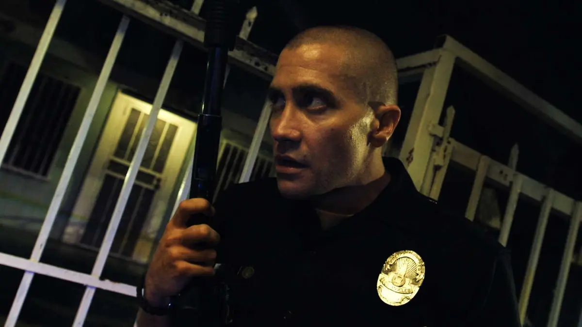 Jake Gyllenhaal with a gun in End of Watch