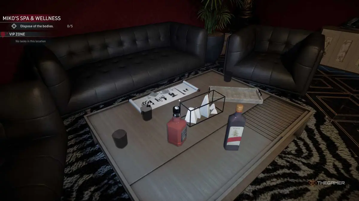 Kovalsky looks at a table on the VIP Room in Crime Scene Cleaner