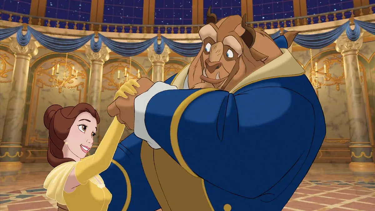 Belle and Beast share a dance in Beauty and the Beast.