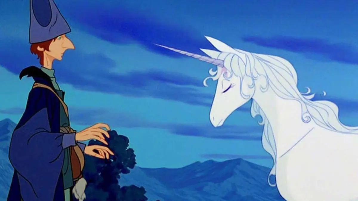 The Unicorn with Schmendrick in The Last Unicorn
