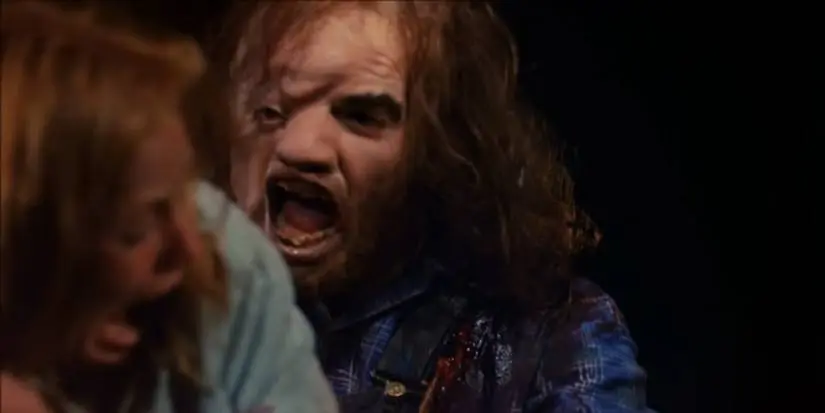 Jason Voorhees unmasked leaping through a window in Friday The 13th Part 2
