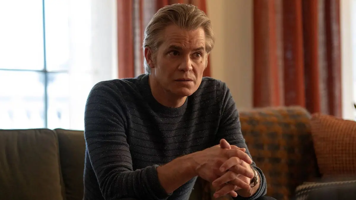 Timothy Olyphant on a couch from Full Circle
