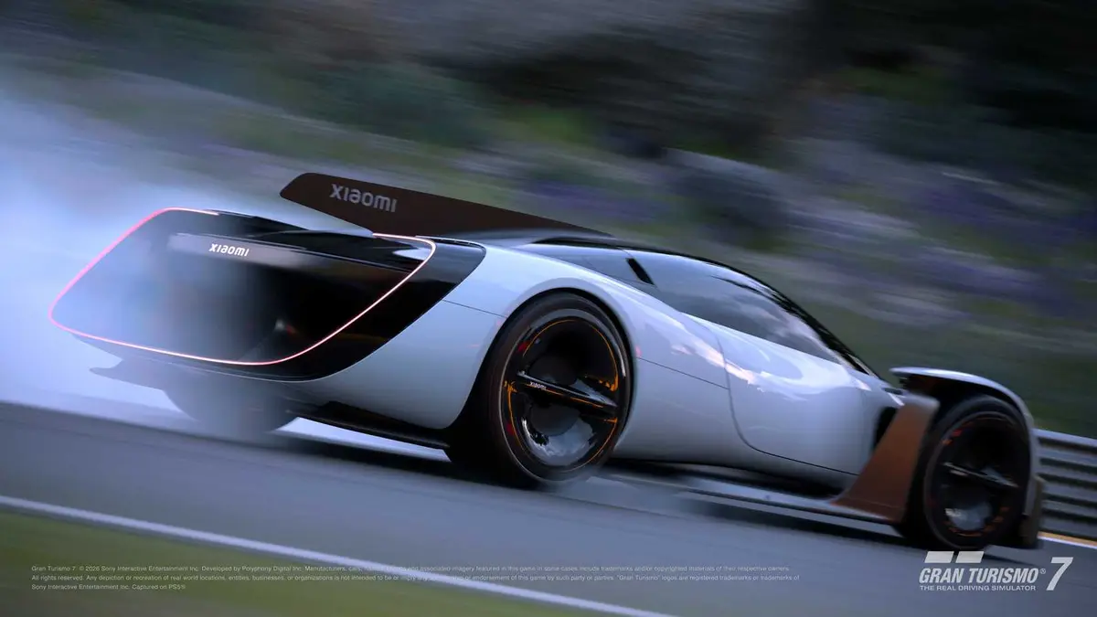 An electric hypercar, the Xioami Vision, racing down a road in GT7.