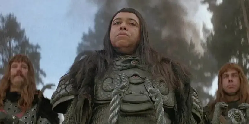 Thulsa Doom and his men look down on a young Conan in Conan the Barbarian