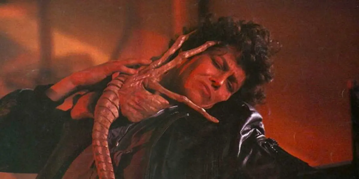 Ellen Ripley being attacked by a facehugger in Aliens