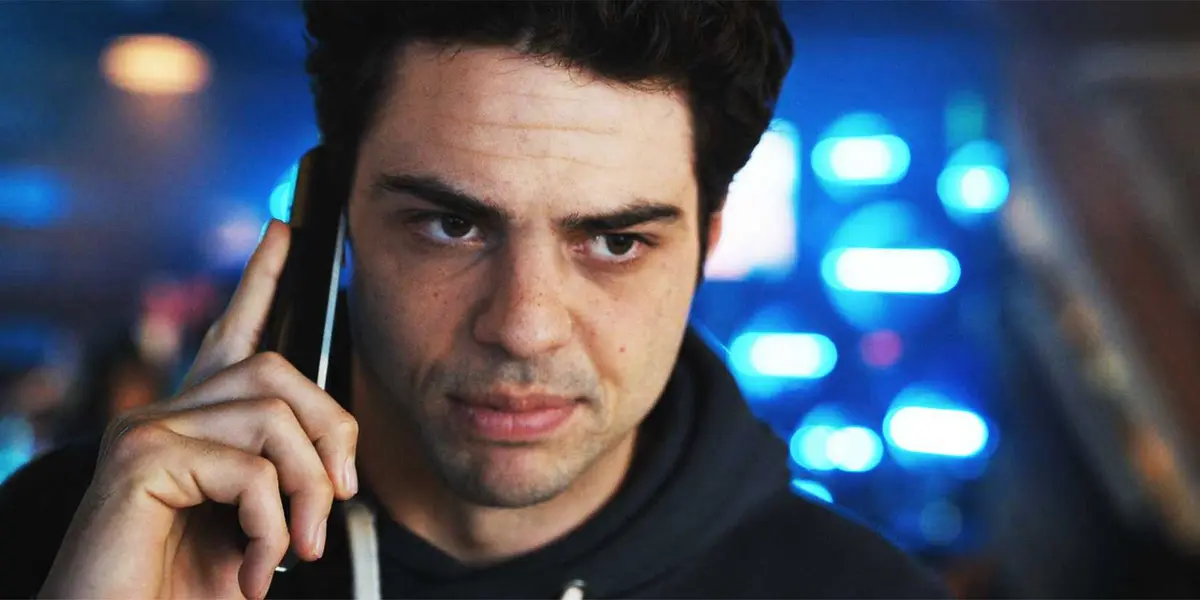 Noah Centineo as Owen in The Recruit season 2, episode 3, talking to someone on the phone