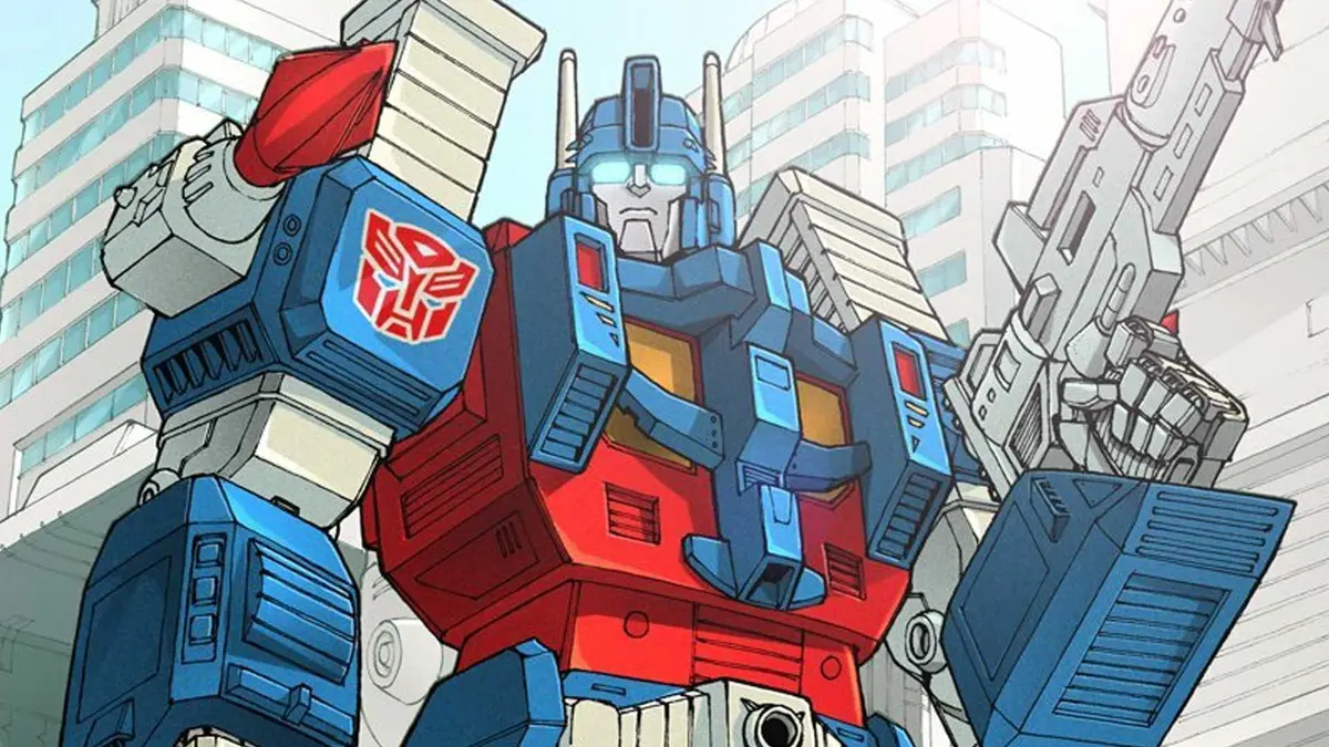 Transformers Ultra Magnus standing in front of city buildings