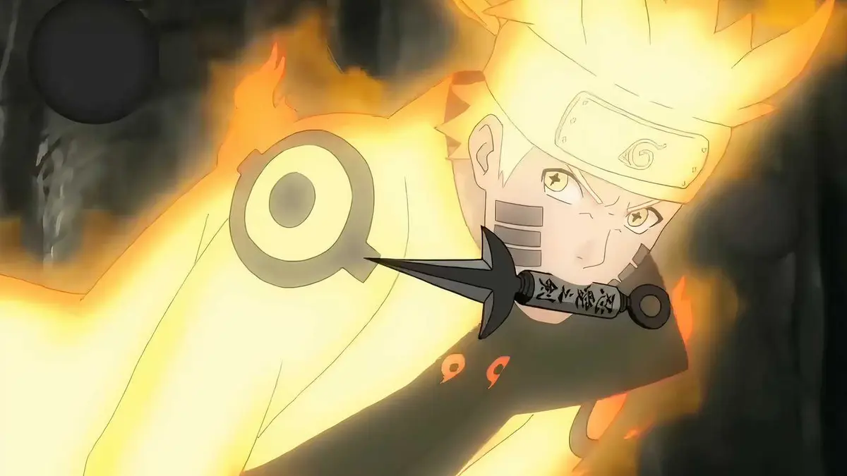 Naruto with a kunai in his mouth in his Six Paths Sage Mode Form