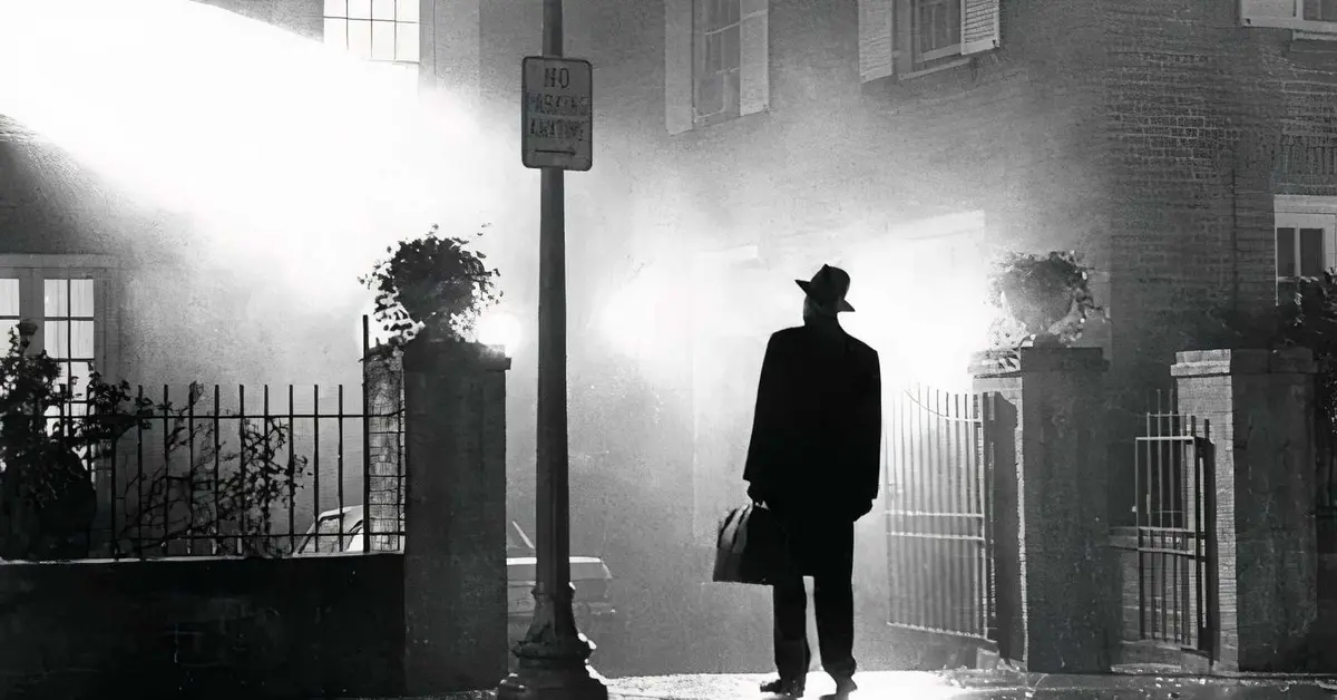 A silhoutted man wearing a suit in The Exorcist