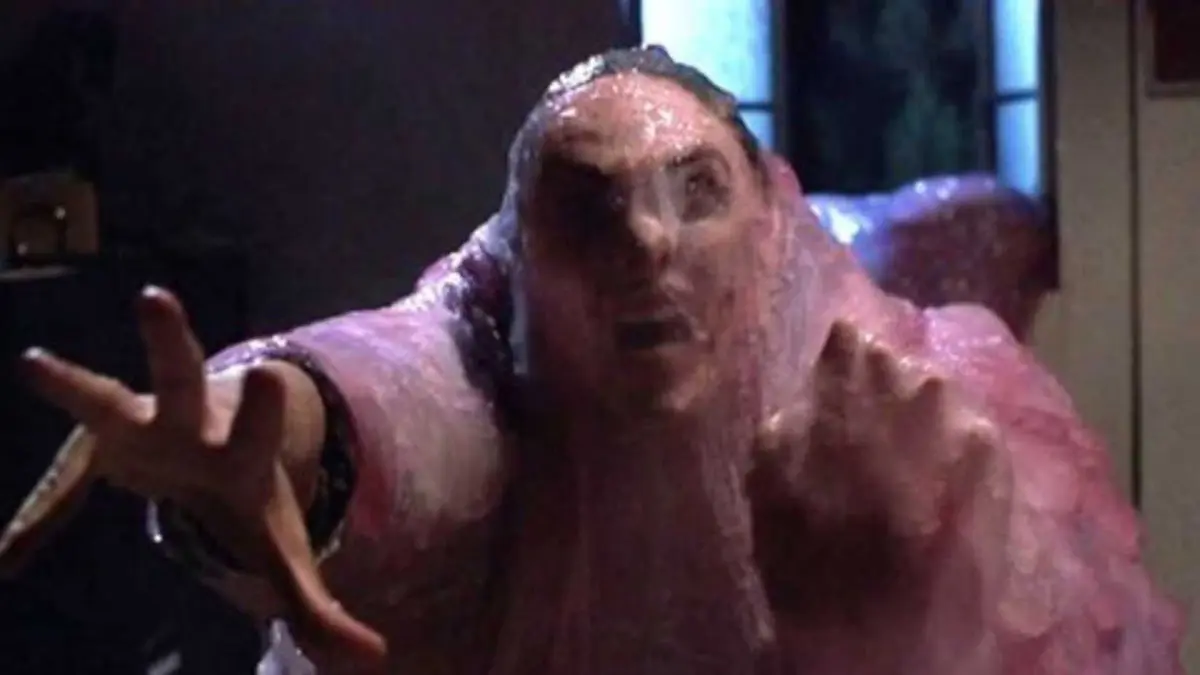 The Blob absorbing a man in the 1988 film