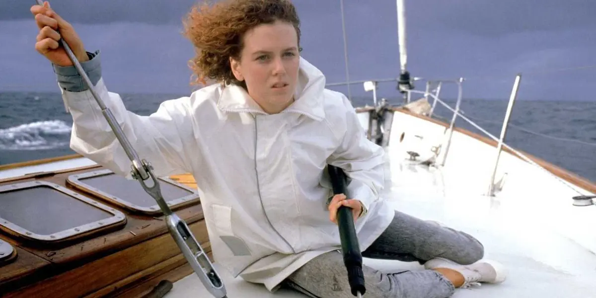 Nicole Kidman drives a sailboat and holds a speargun in Dead Calm
