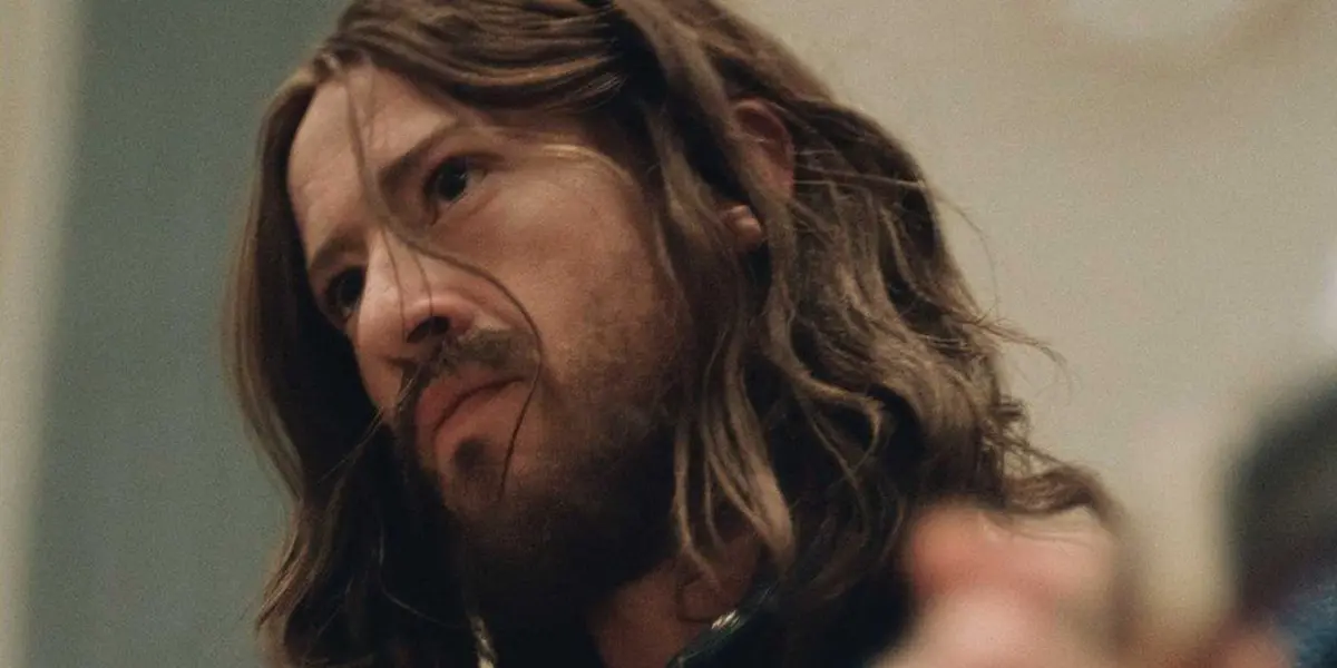 Joseph Quinn as George Harrison in The Beatles A Four-Film Cinematic Event