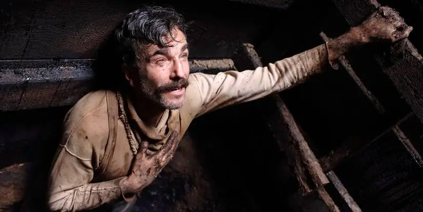 Daniel Plainview crawls out of a dark hole in THERE WILL BE BLOOD (2007)