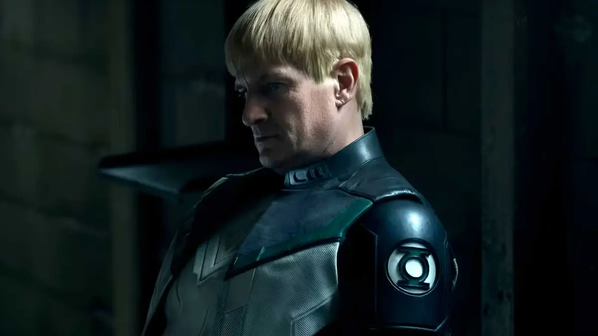 Nathan Fillion's Guy Gardner sits in the dark in Lanterns